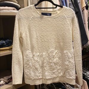 Knitted sweater with lace